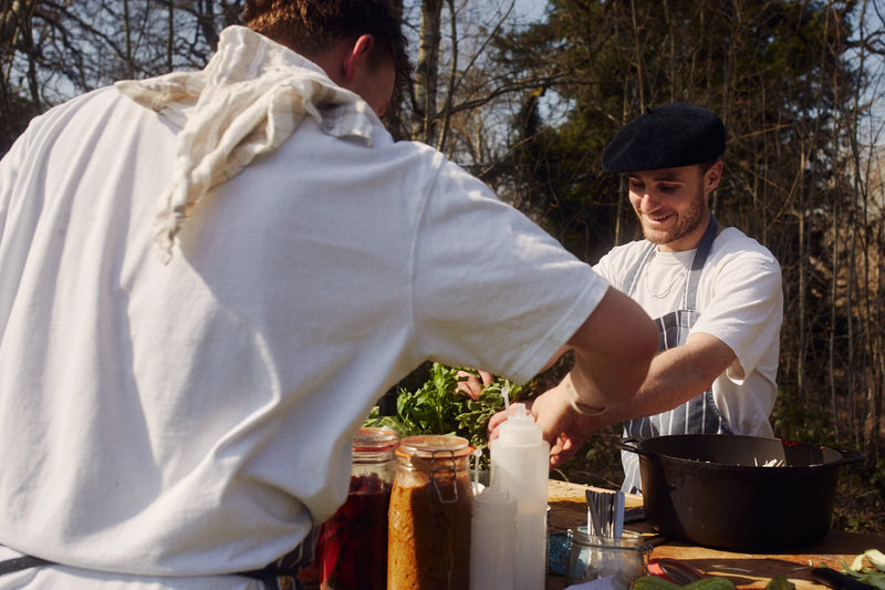 The Kitchen 94 team cooking outdoors